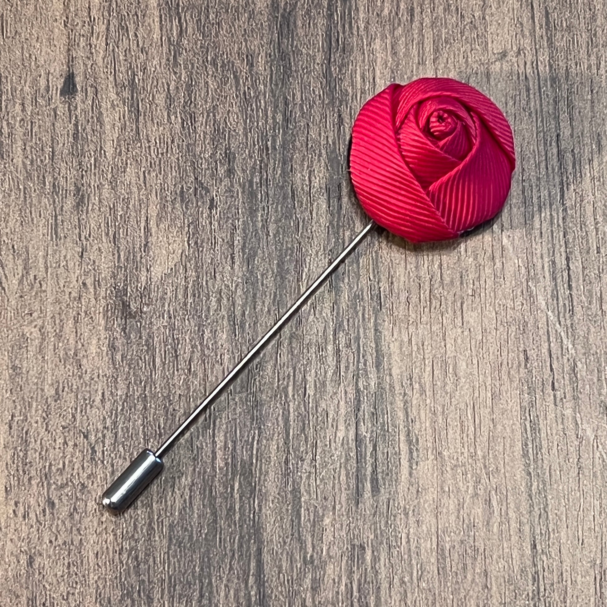 Tasker & Shaw | Luxury Menswear | Red textured rosebud boutonniere