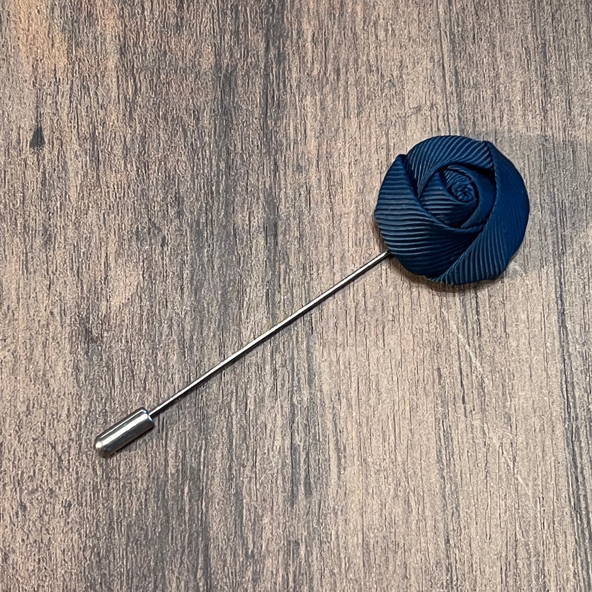 Tasker & Shaw | Luxury Menswear | Black textured rosebud boutonniere