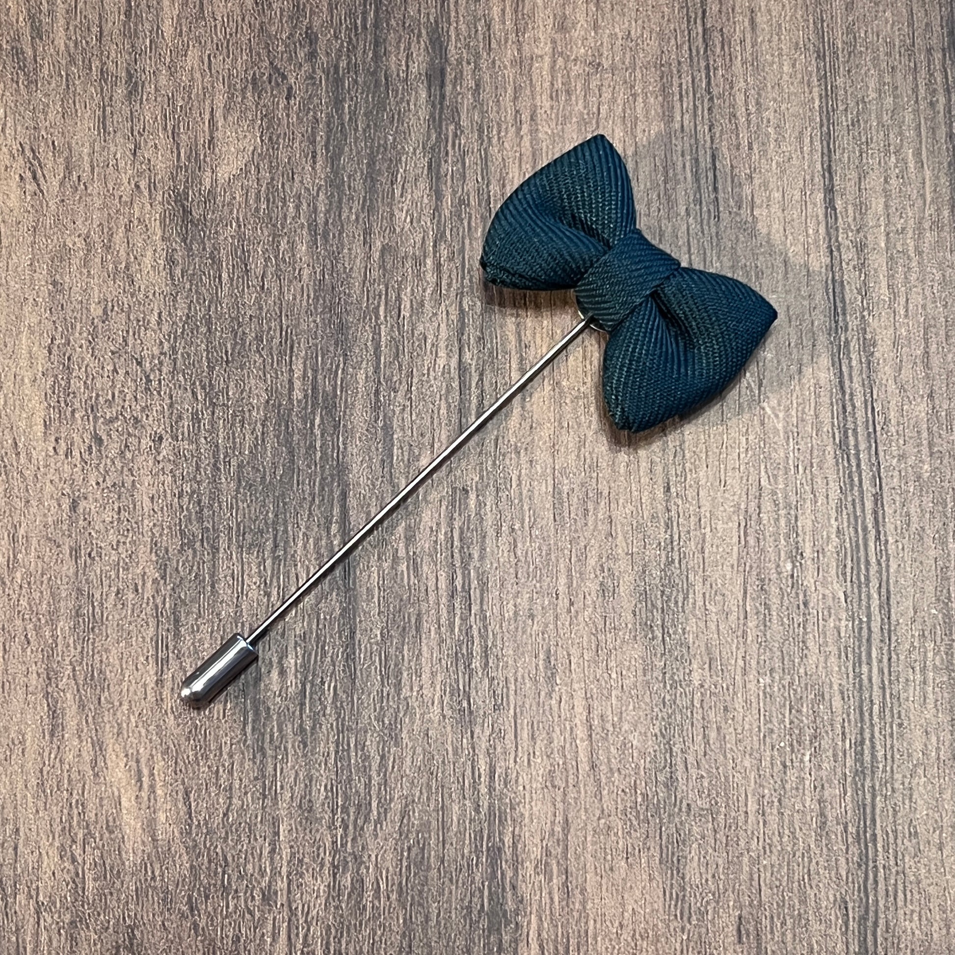 Tasker & Shaw | Luxury Menswear | Dark green bowtie lapel pin