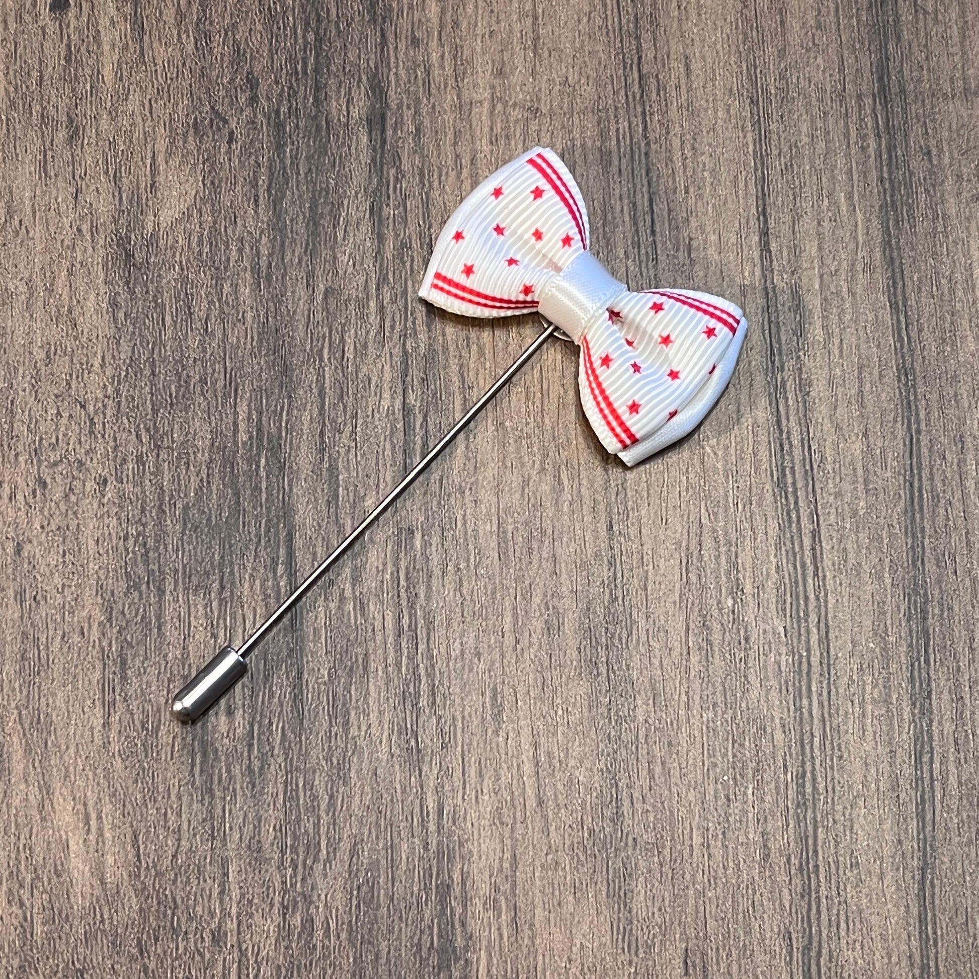 Tasker & Shaw | Luxury Menswear | White with red stripes bow tie lapel pin