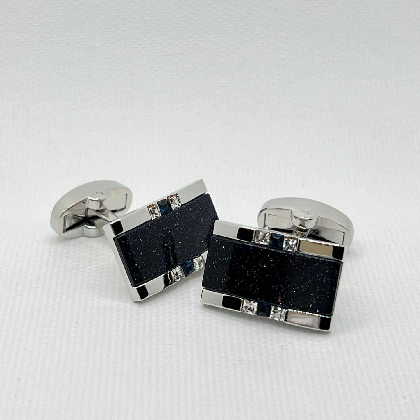 Tasker & Shaw | Luxury Menswear | Silver rectangluar cufflinks with shimmering darkest blue inlay
