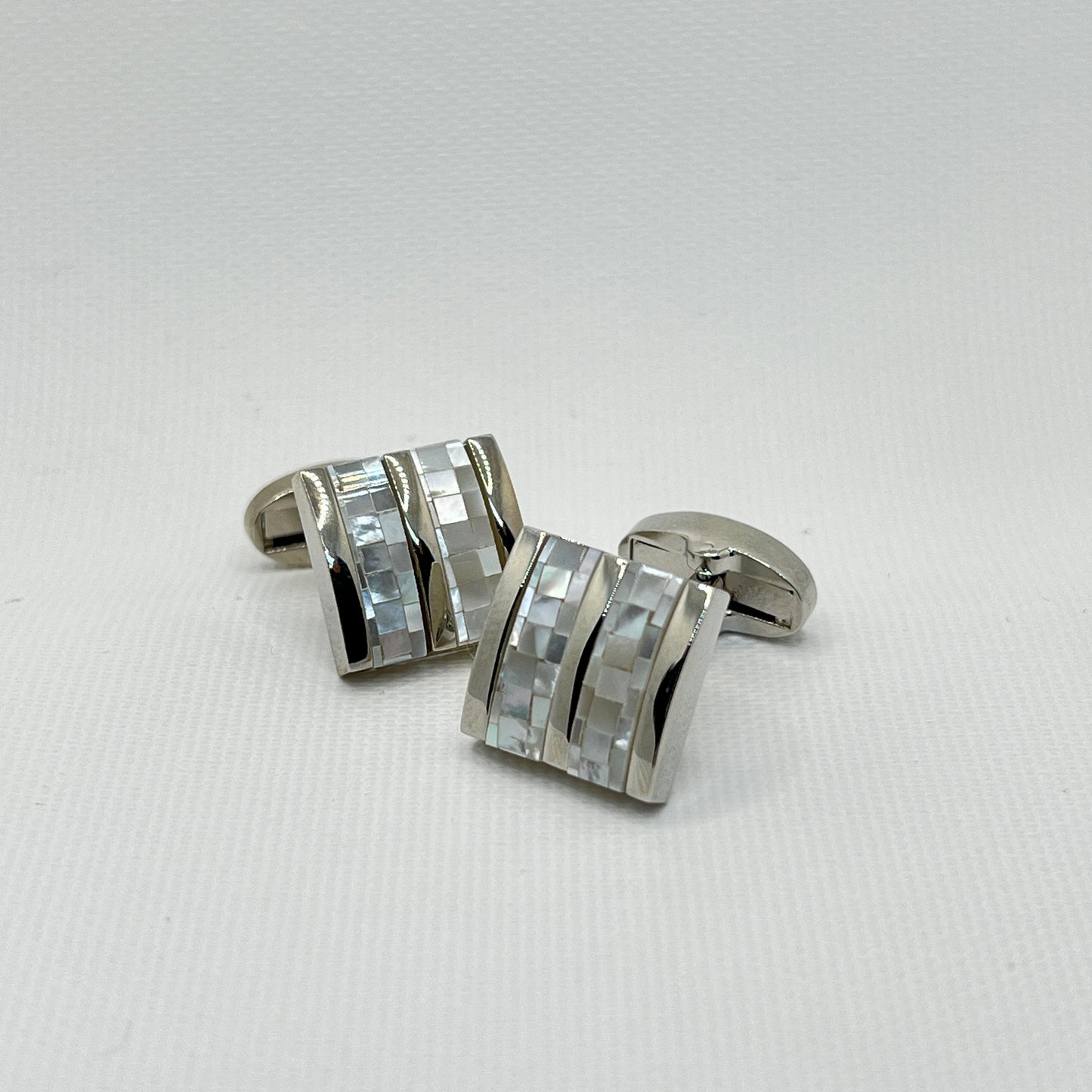 Tasker & Shaw | Luxury Menswear | Silver striped cufflinks with mother of pearl inlay