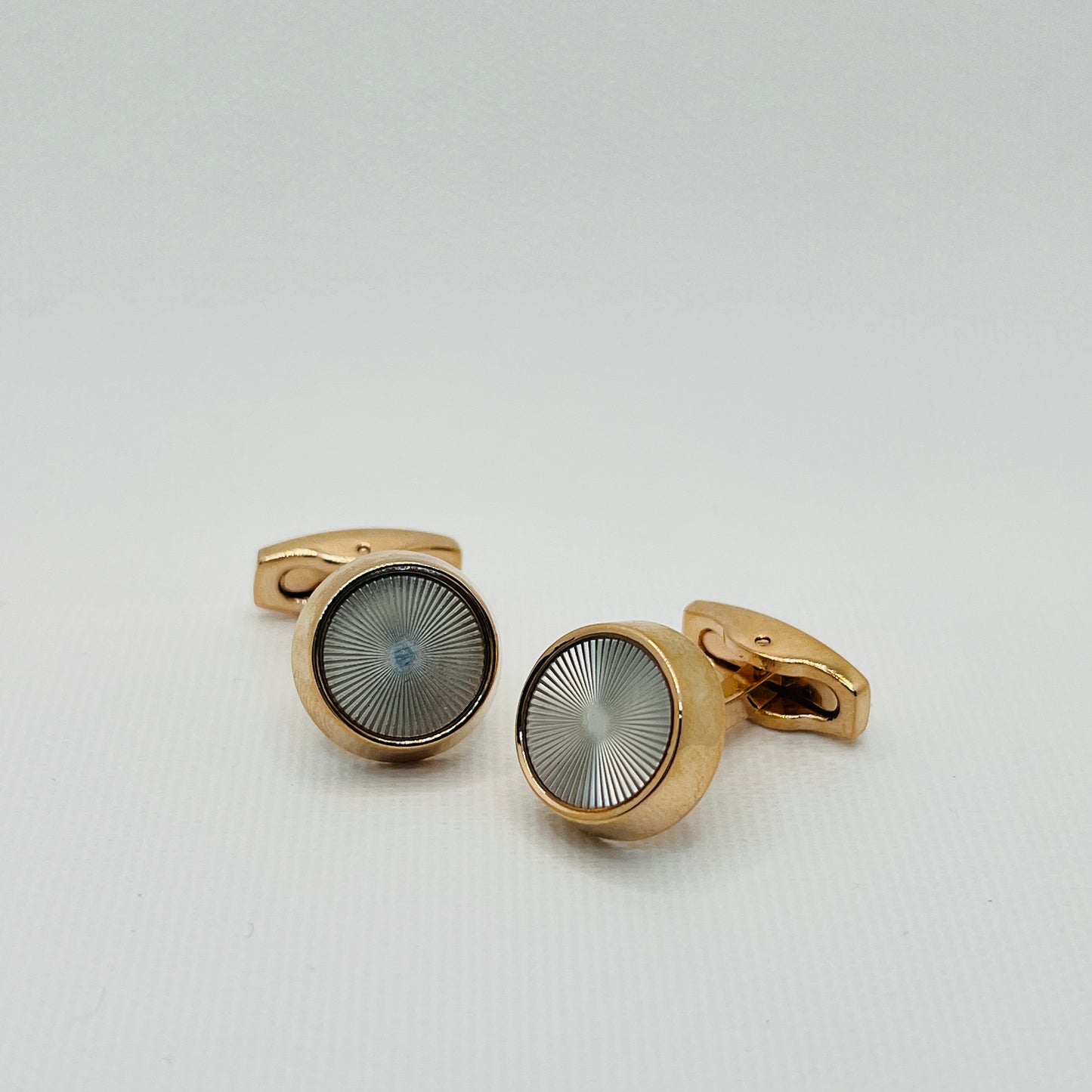 Tasker & Shaw | Luxury Menswear | Gold round cufflinks with machined face