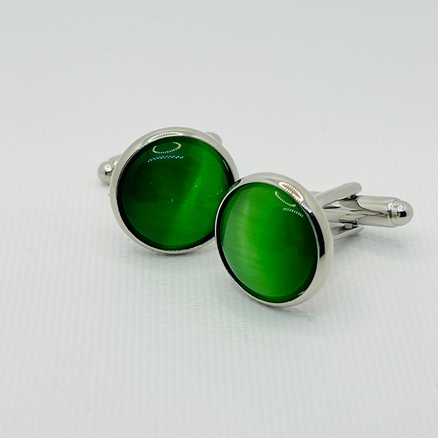 Tasker & Shaw | Luxury Menswear | Round silver cufflinks with vivid green inlaid face